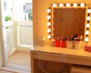 Dressing table with mirror and lighting