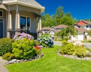 Landscaping of the courtyard of a private house: photo